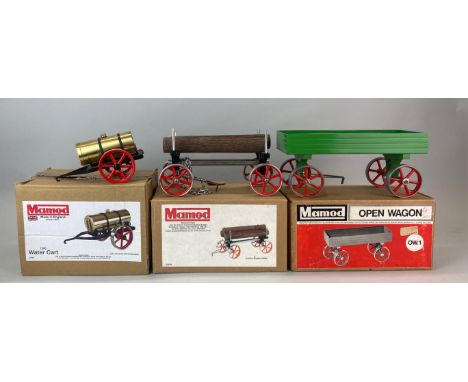 A boxed Mamod open wagon OW.1 together with a boxed Mamod water cart C512 and a boxed traction engine trailer C510.