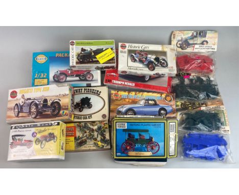 Forteen boxed model kits of various automobiles by Airfix and others.