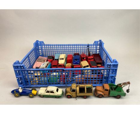 A group of mostly early unboxed Dinky Toys diecast model vehicles.