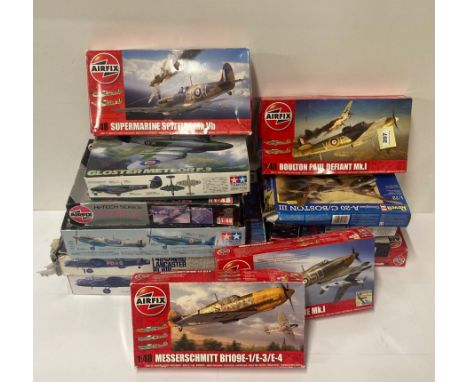 Thirteen boxed model aeroplane kits including Airfix, Tamiya, Revell and others. Either part assembled and spares.