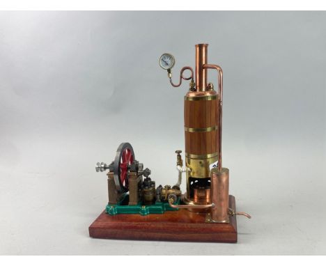 A very well made single cylinder upright static steam engine (unknown make).