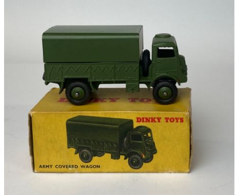 A boxed Dinky Toys model no. 623 'Army covered wagon'.