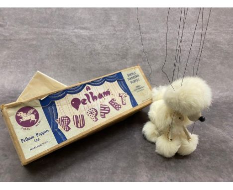 A vintage Pelham poodle puppet