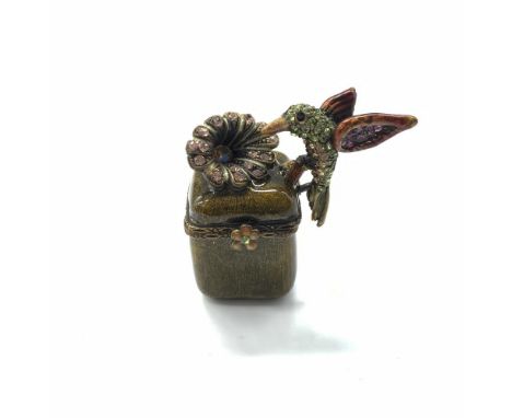 Delicate tiny trinket box with enamel and colorful crystals. Jay Strongwater stamp on the bottom. Dimensions: 1.5"L x 1"W x 1
