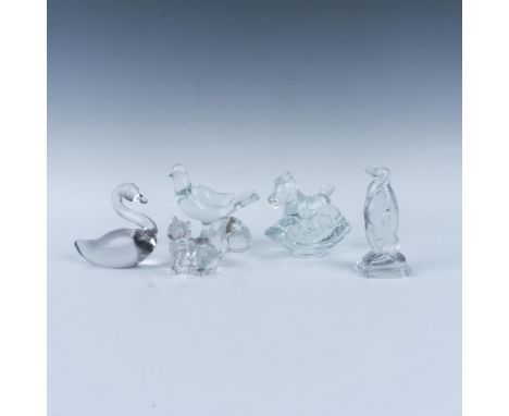 This charming collection includes an adorable rocking horse candle holder, two Fostoria pieces including a penguin and a squi