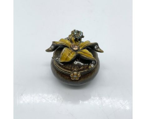 Beautiful trinket box decorated with enamel and colored crystals. Jay Strongwater stamp on the bottom. Dimensions: 1.25"dia. 