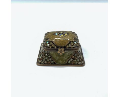 Beautiful tiny trinket box with enamel and colored crystals. Jay Strongwater stamp on the bottom. Dimensions: 1.5"L x 1.75"W 