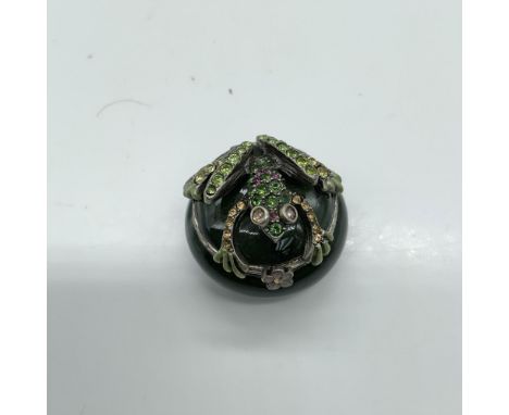 Beautiful trinket box decorated with enamel and colored crystals. Jay Strongwater stamp on the bottom. Dimensions: 1.25"dia. 