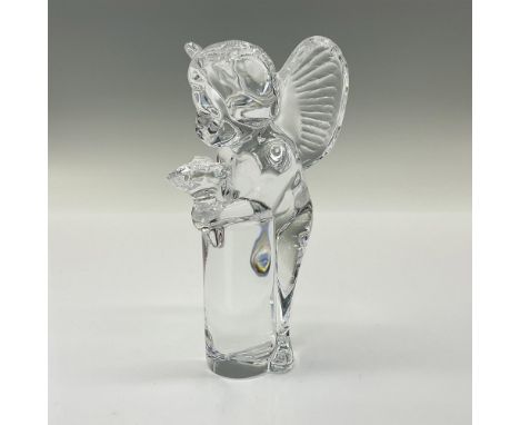 This is a clear crystal depiction of a Cherub leaning against a pillar with a bouquet in hand. This item has its original box