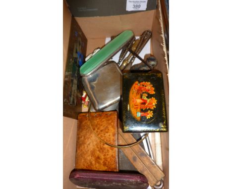 Cigarette cases, silver-handled shoe horns and button hooks, pince nez spectacles, etc.,