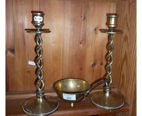 Iron and brass ladle scoop in the manner of Archibald Knox and a pair of open barley twist brass candlesticks