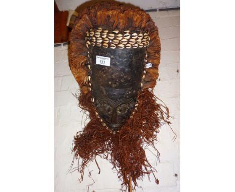 Tribal Art: Large African tribal mask with cowrie shell adornment