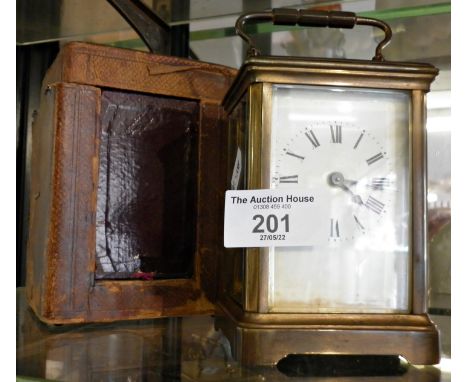 19th c. brass carriage clock with leather case (good working order)