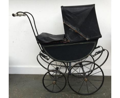 A coach built doll's pram, ceramic handle and brass fittings, 74cmH including hood 