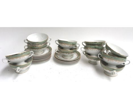A set of 12 lover's cups and 12 saucers, 'Chinastyle', by Simpsons (Potters) Ltd 