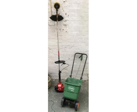 A Zenoah BC2200L petrol strimmer, together with a Scotts EasyGreen rotary seed spreader 