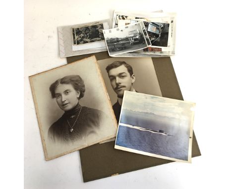 A collection of photographs including Hitler propaganda cards, and private photographs of King George VI and the then Princes