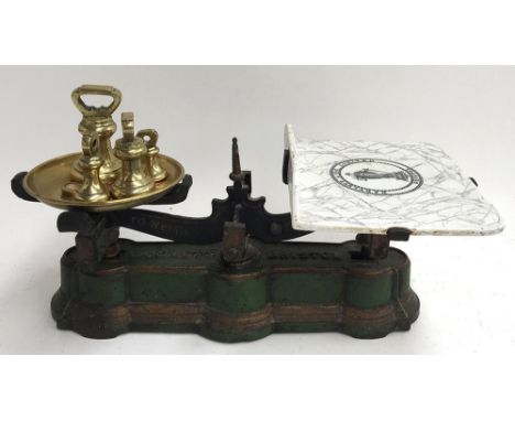 A vintage set of kitchen scales by Bartlett &amp; Son, Bristol, with weights 