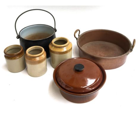 Three stoneware jars, a metal cooking pot, a brown stoneware casserole dish marks S to base, and a heavy copper and brass coo