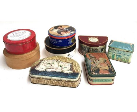 A quantity of vintage biscuit tins including Edward Sharpe &amp; Co, and Huntley &amp; Palmers, most containing sewing access