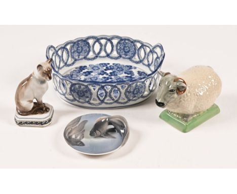 A Copenhagen fish dish.  diameter 12 cm, together with a ceramic ram, a seated cat and a pierced blue and white bowl.