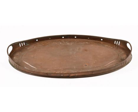 A Newlyn embossed copper oval tray.  Length 48 cm.   CONDITION REPORT:  The fish and shells appear quite dull.  When viewed f