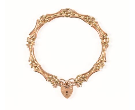 A 9 ct gold gate fold style bracelet, with 9 ct gold padlock clasp.  Weight 7.8 grams.