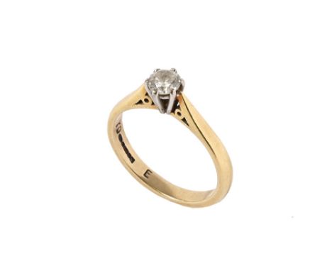 An 18 ct gold solitaire diamond ring.  Size L/M. weight 3.2 grams.
