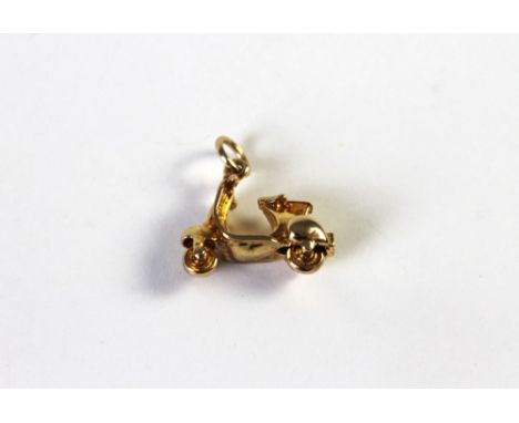 A 9 ct gold Vespa scooter charm, weight 3.3 grams.