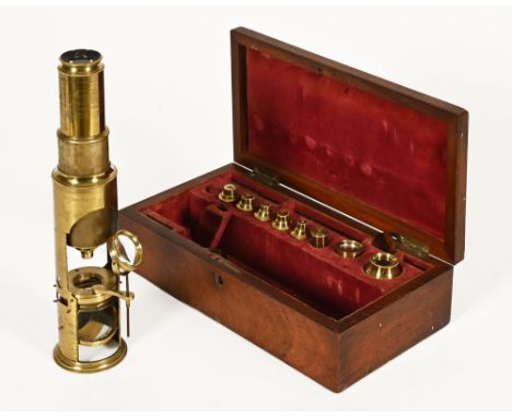 A 19th century compound drum microscope by J P Cutts & Son Sheffield, circa 1825-1850 in fitted mahogany case with a range of