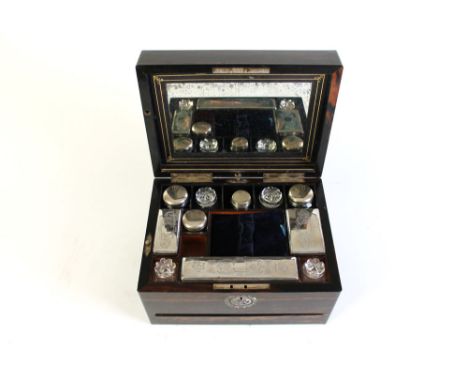 A 19th century coromandel wood and inlaid mother of pearl dressing case, with drawer with silver plated accessories and mirro