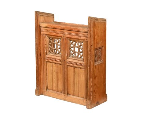 A Victorian pitch pine Gothic lectern, with single open shelf to the rear.  Height 108 cm, width 83 cm, depth 36 cm.