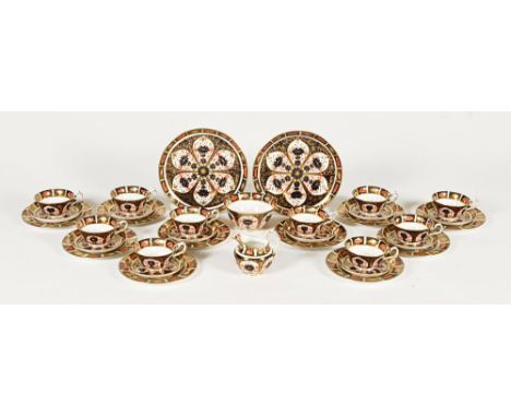 A Royal Crown Derby Imari pattern part tea set, 2 large plates, 10 side plates, 10 saucers, 10 cups, milk jug and sugar bowl,