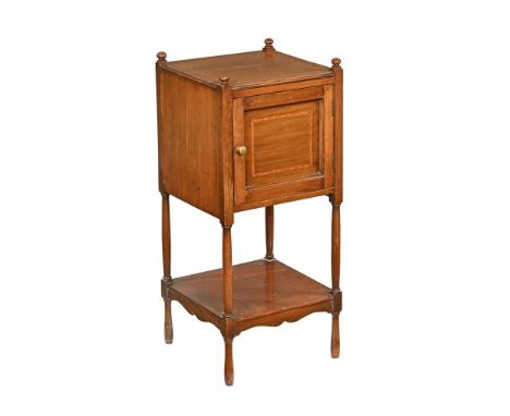 An Edwardian inlaid pot cupboard, with single cupboard door and with shelf below raised on circular tapering legs.  Height 76