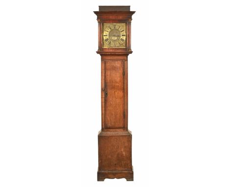 Legge of Axminster a Georgian brass faced 30 hour longcase clock, with single hand and mahogany crossbanded case, the hood wi