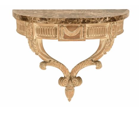 Paul Ferguson Fine Wood Carving and Gilding, a limed pine wall hanging console table with brown marble top.  Height +/- 65 cm