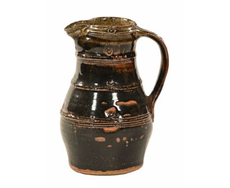 Jim Malone (born 1946), a studio pottery jug, with impressed J M and further mark illegible.  Height 22 cm (see illustration)