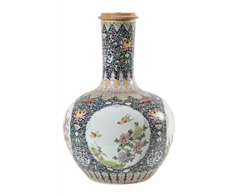 A large oriental Cantonese style decorative table lamp, with large bulbous vase body with floral decoration and four decorati