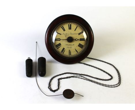 A 19th century postman's alarm clock, marked Loeffler and Febrenbach Black Heath Road, case diameter 28 cm, complete with wei