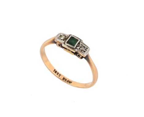An 18 ct gold diamond and emerald ring.  Size K.
