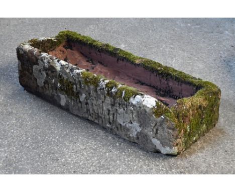 A 19th century rectangular sandstone trough.  Height +/- 23 cm, width 35 cm, length 91 cm.