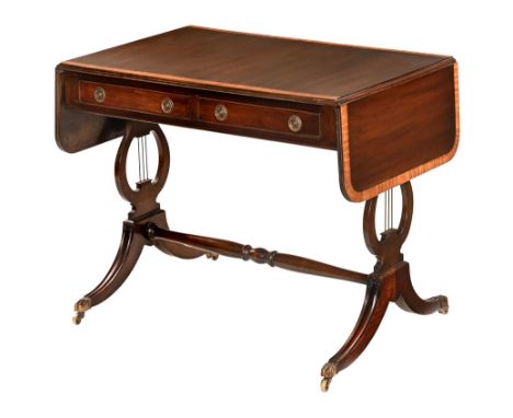 A reproduction inlaid mahogany sofa table, with two drawers and lyre shaped sides united by a cross stretcher and raised on d