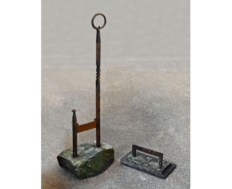 A 19th century wrought iron boot scraper, mounted in a sandstone block.  Height 112 cm, and another length 38 cm.   CONDITION