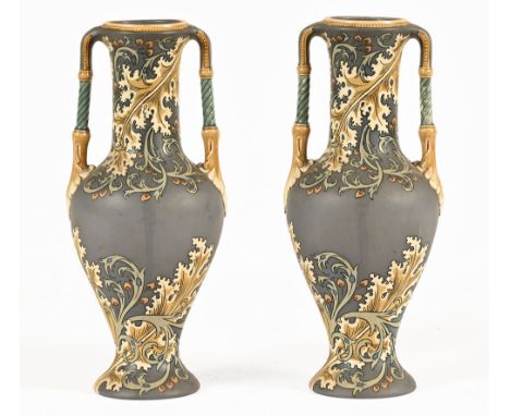 A pair of Villeroy & Boch Mettlach two handled vases, embossed tower mark dated 1898, Model No. 2414 in amphora form, decorat