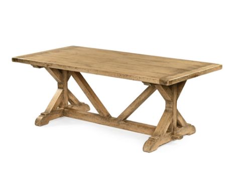 A large pine dining table, with rectangular top with centre and ends supports raised on sledge feet.  Height 73 cm, width 100