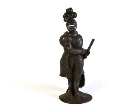 A vintage fireside companion set, in the form of a knight in armour.  Height 46 cm.