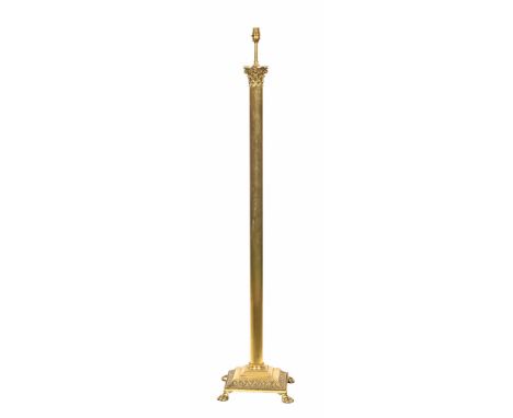 A brass Corinthian column lamp standard, with square stepped base raised on short paw feet.  Height 140 cm including light fi