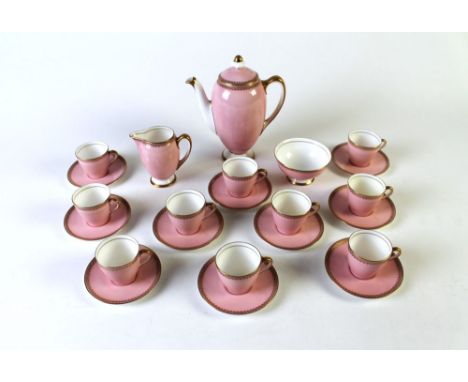 Royal Doulton pink and gilt coffee set, ten coffee cups, saucers, jug bowl and coffee pot.