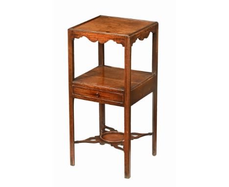 A George III mahogany square washstand, with single drawer and shaped pierced low shelf.  Height 76 cm, top 35.5 cm square.  