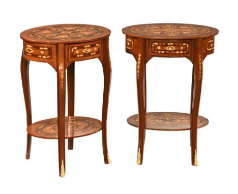 A pair of inlaid oval bedside or side tables, with central drawer and shelf below.  Height 73 cm, width 54 cm, depth 40 cm.